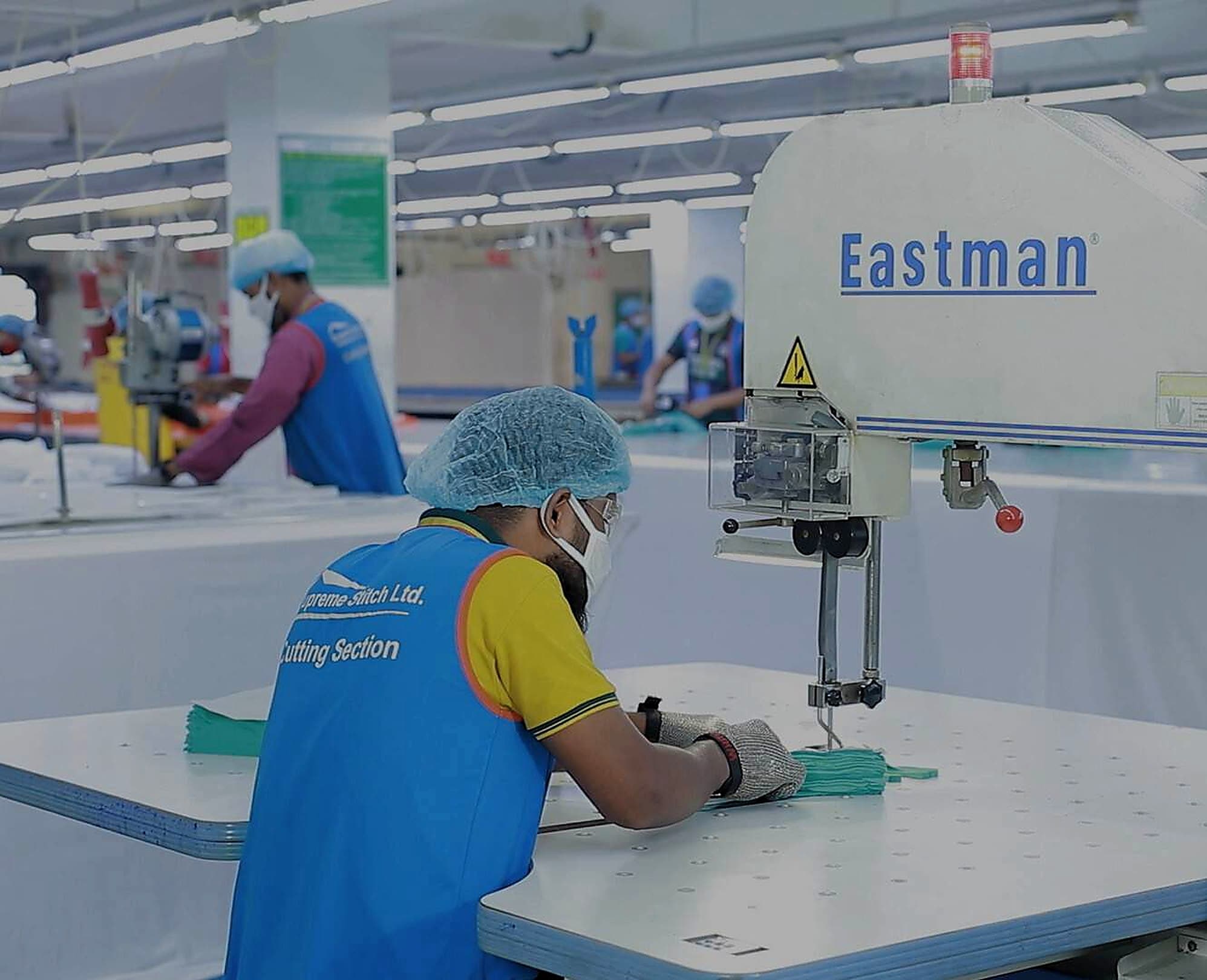 Operator at an Eastman cutting machine